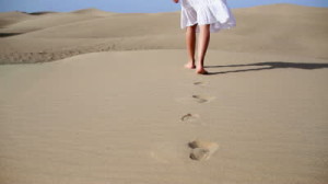 Woman-Walking-in-Desert